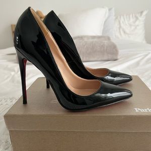 Black heels with red bottoms,